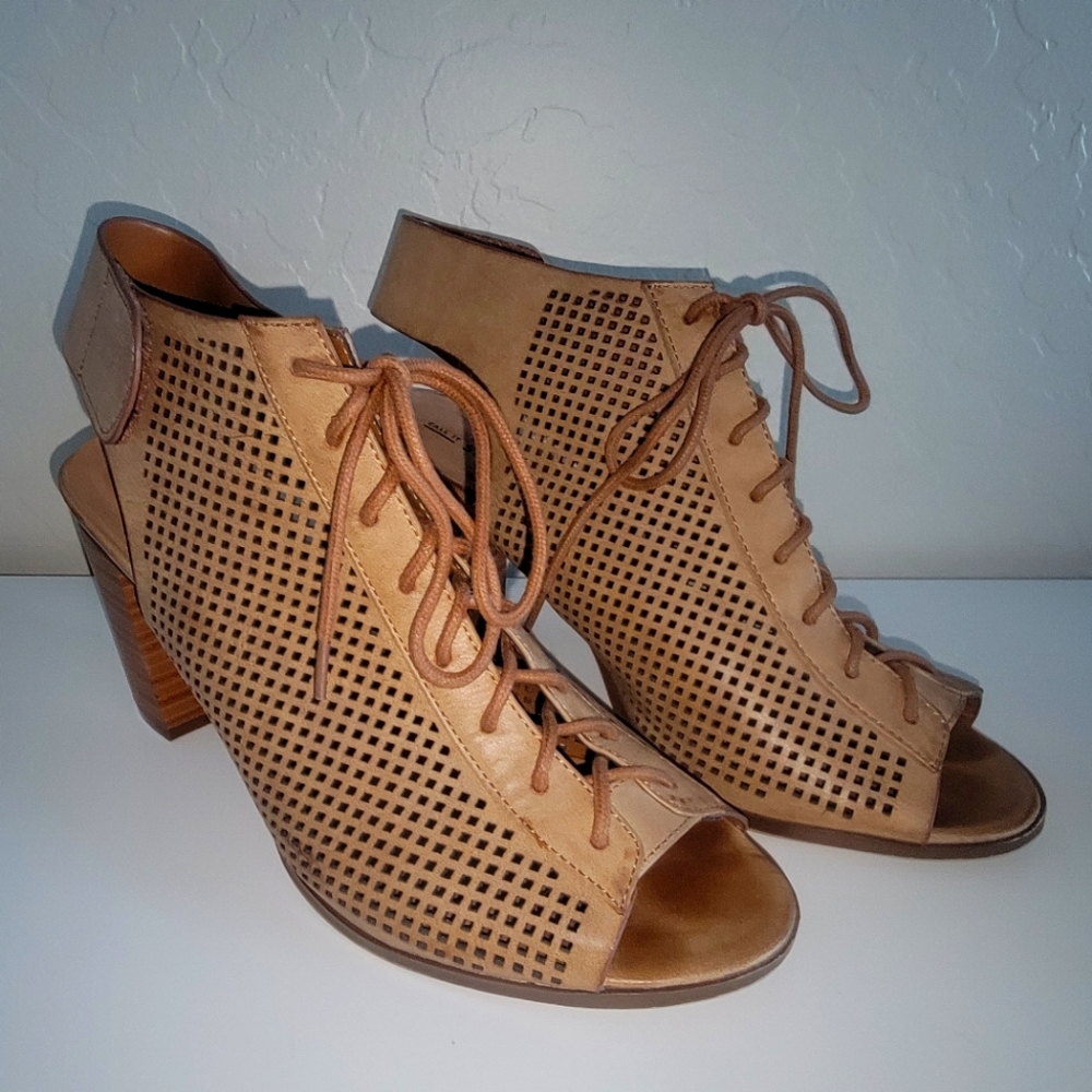 Tan perforated, open-toe heels